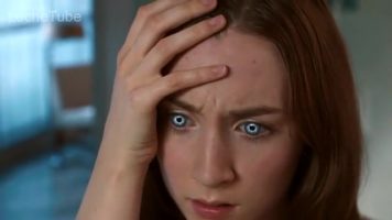 Saoirse Ronan is surrounded by pornographic neighbors