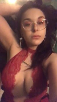 Teasing herself naked